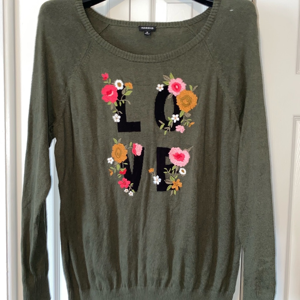 “Love” embroidered green sweater